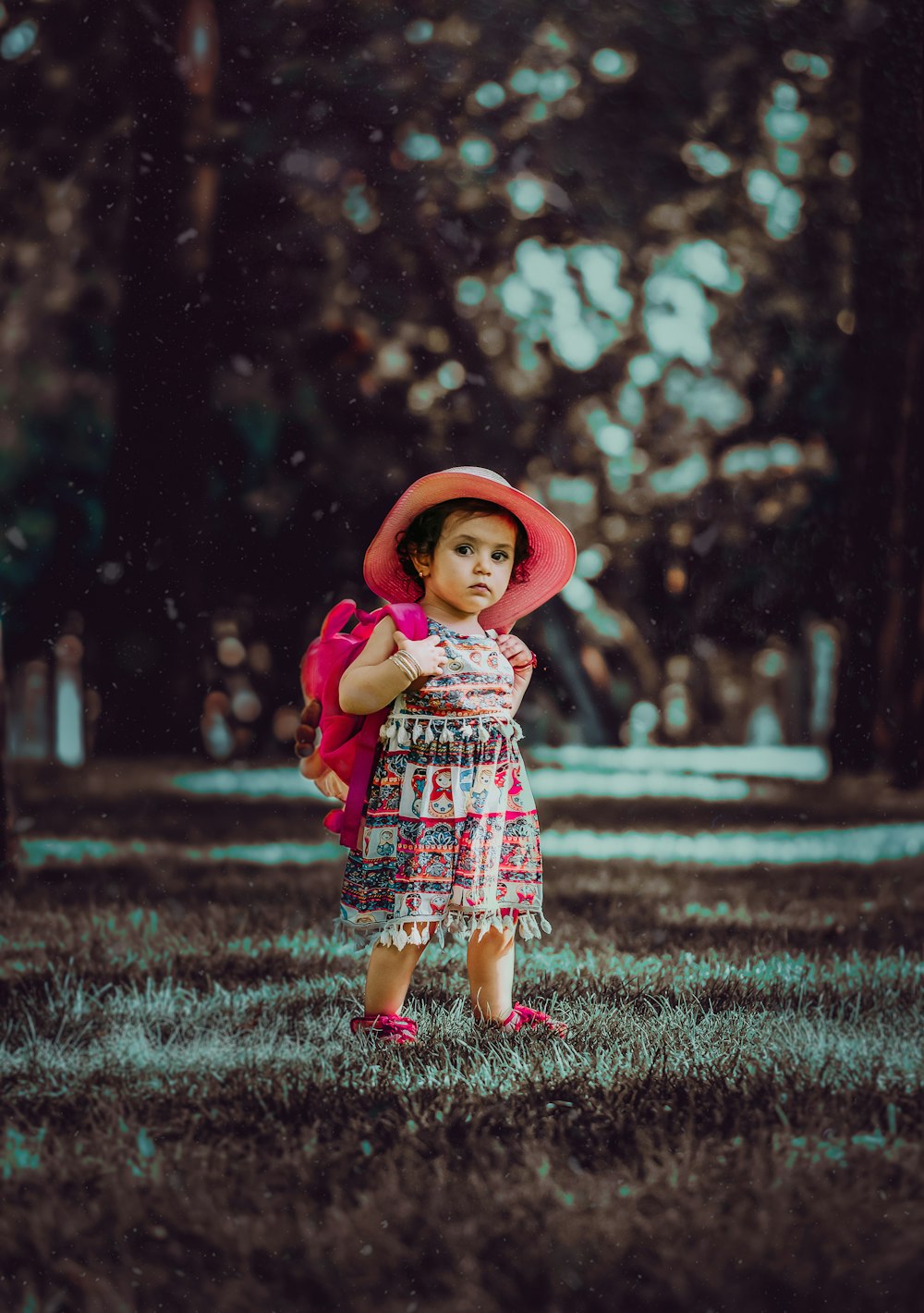 toddler carrying backpack