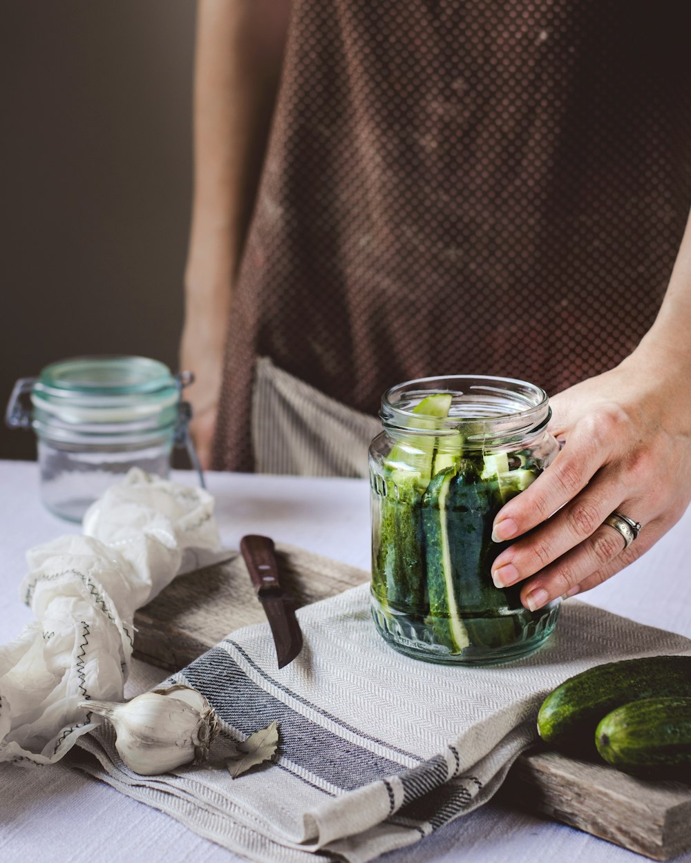 pickle jar on white textile