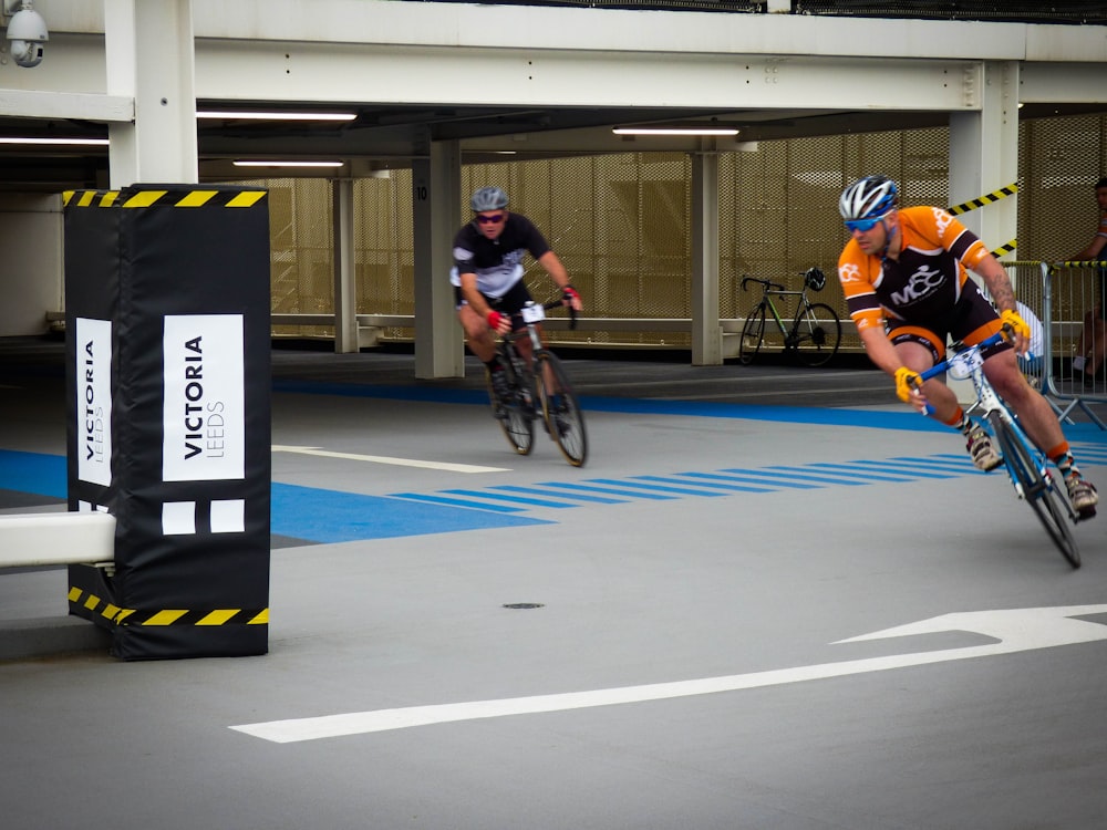 two men riding road bikes