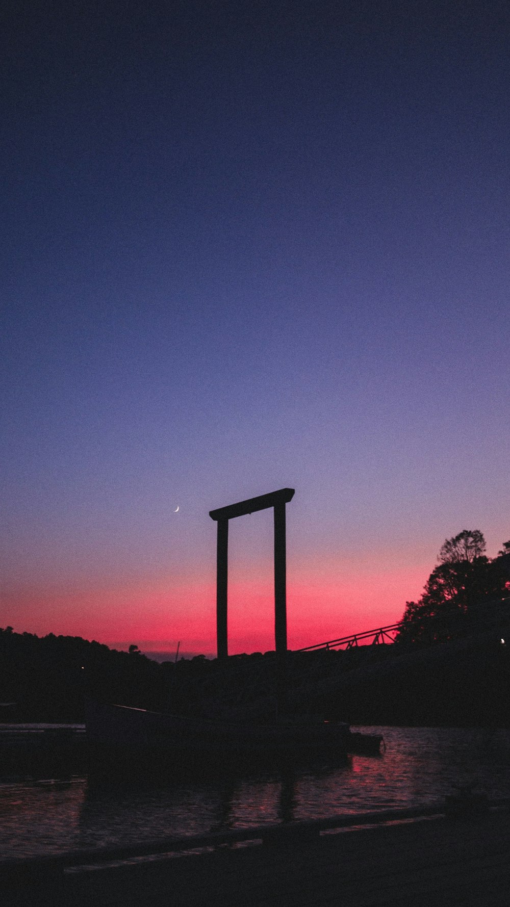 silhouette photography of gate