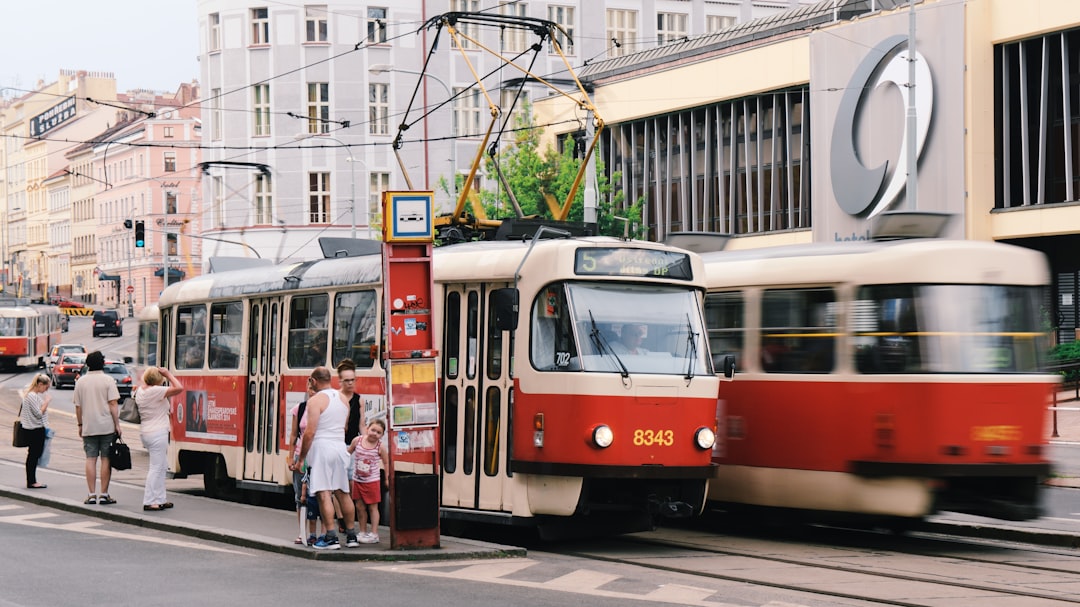 time lapse photo of bus passing by people