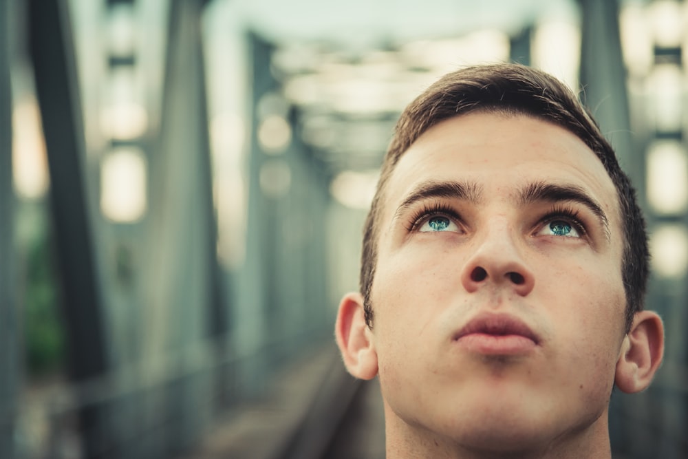 man looking upwards