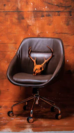 brown leather rolling chair