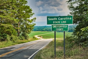 South Caroline State Line street sign