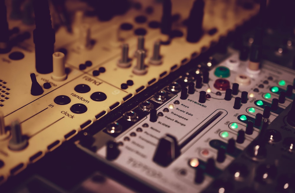 selective focus photography of mixing console