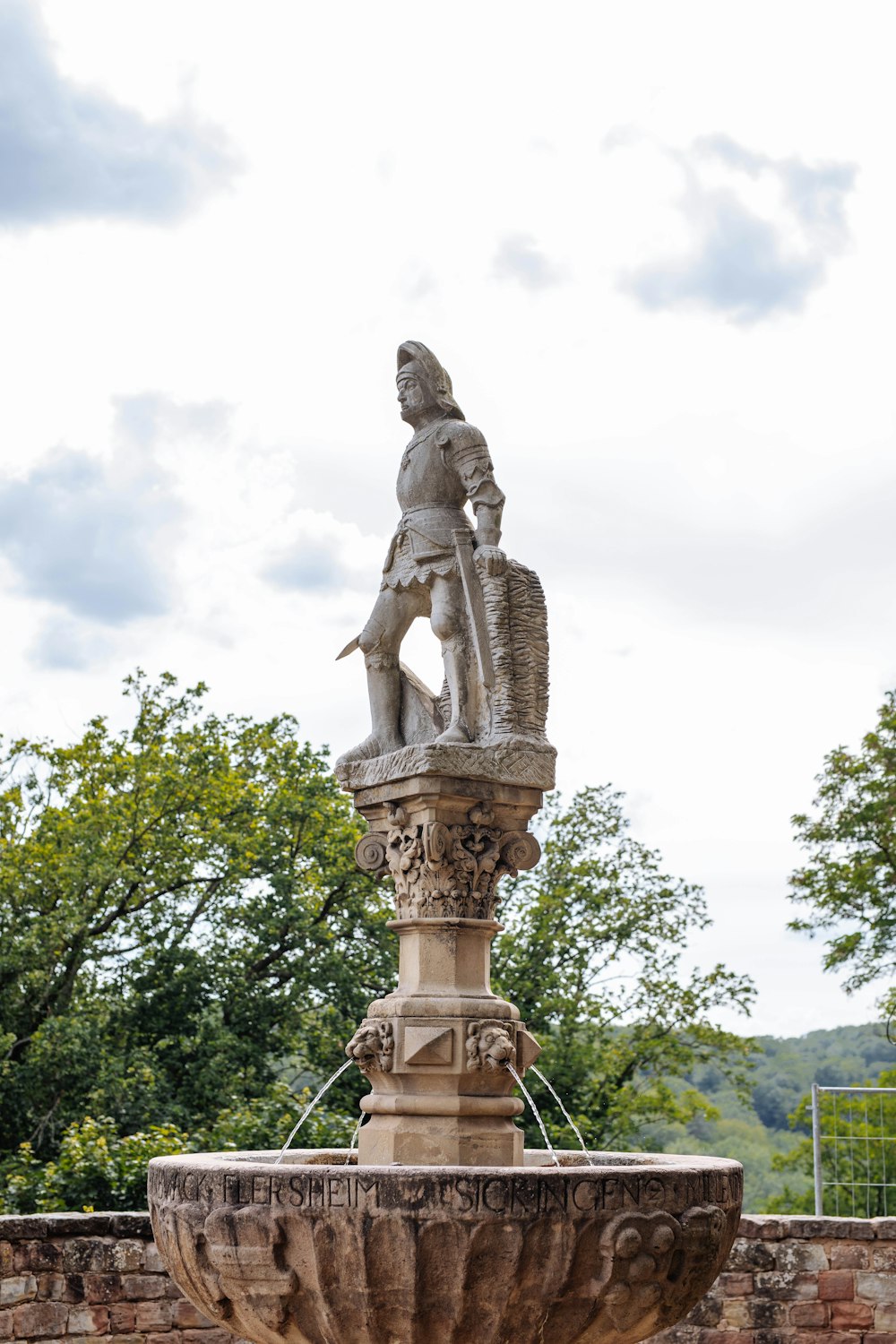 warrior statue water fountain