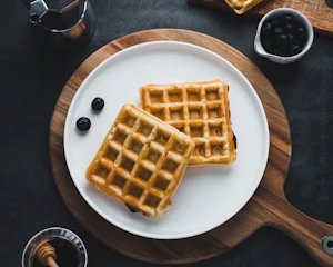 Crispy fried chicken on golden waffles