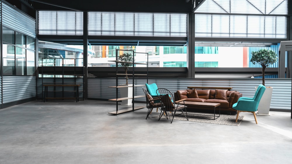 vacant chairs in a room during daytime