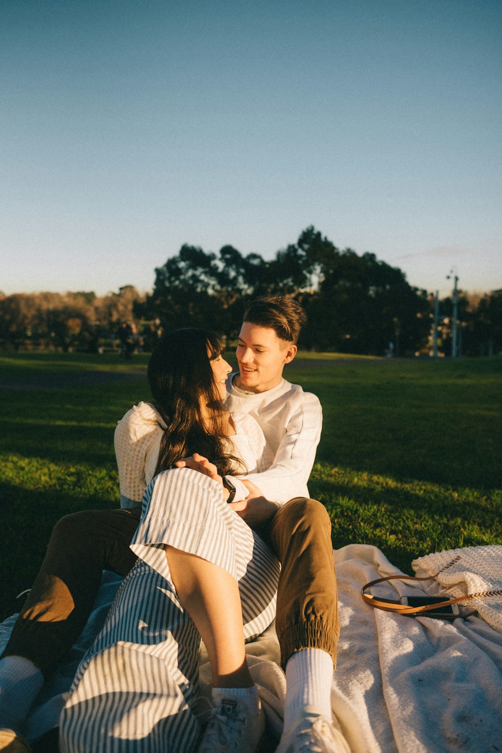 man hugging woman