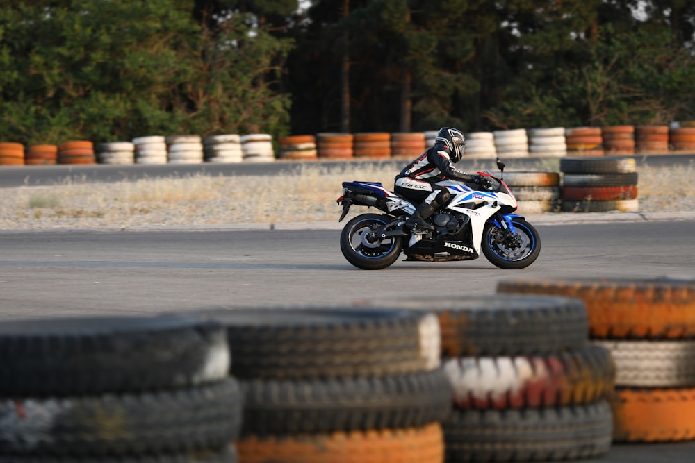 man riding sports bike