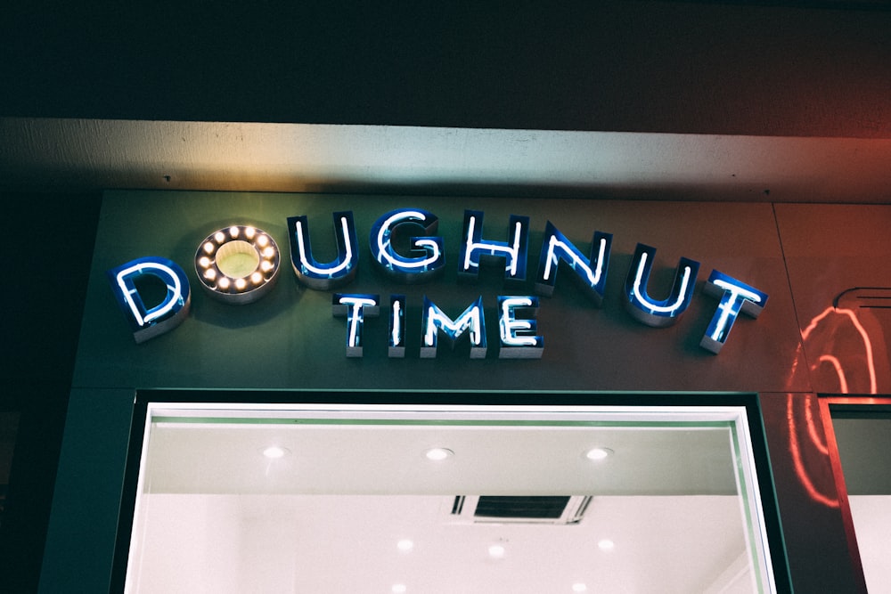 white Doughnut Time neon signage