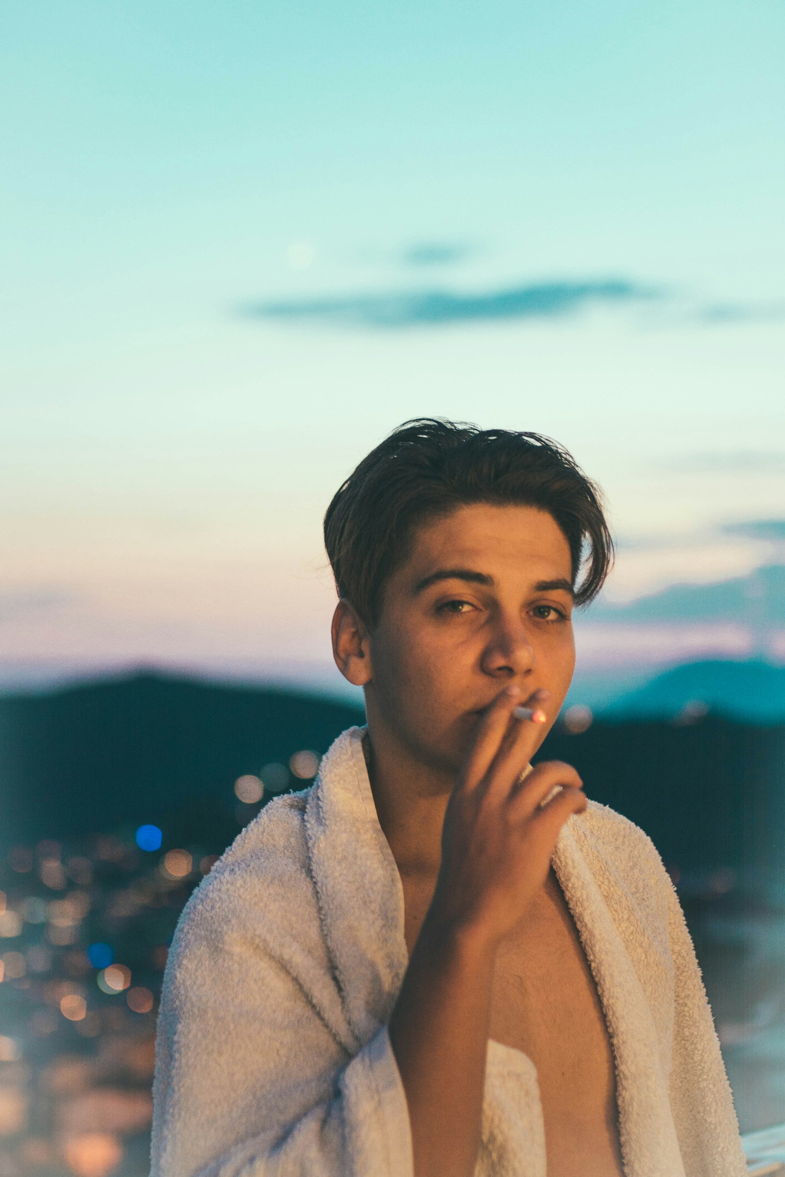 Nikon D7100 + Sigma 35mm F1.4 DG HSM Art sample photo. Man holding cigarette photography