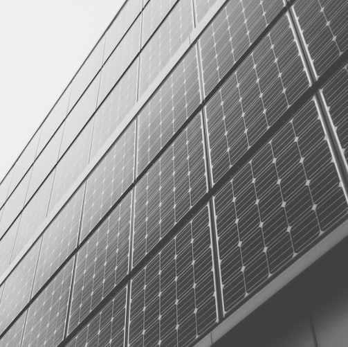 close-up photography of black and gray concrete building