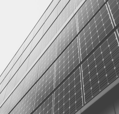 close-up photography of black and gray concrete building