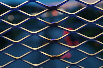 gray metal mesh fence