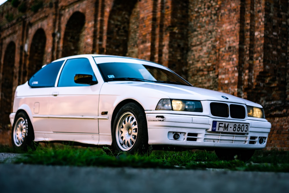 white BMW sedan