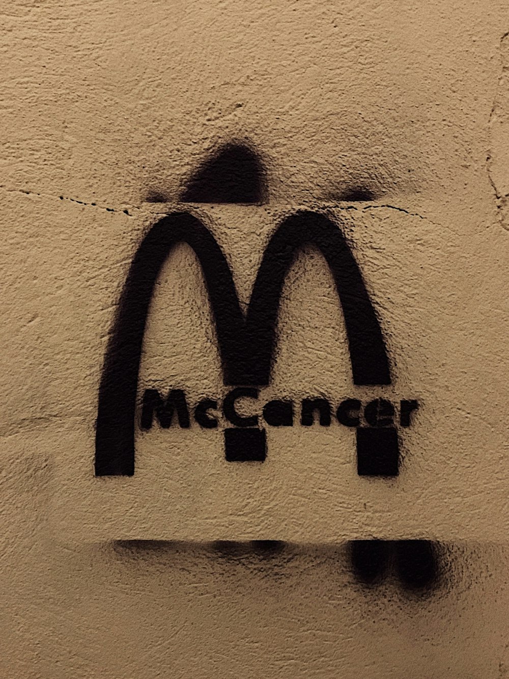 a picture of a mcdonald's logo on a wall