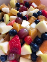 A happy family enjoying fresh fruits together.