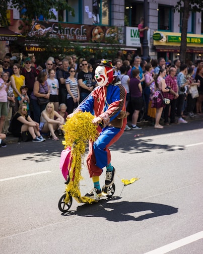 A colorful clown entertaining children at a birthday party