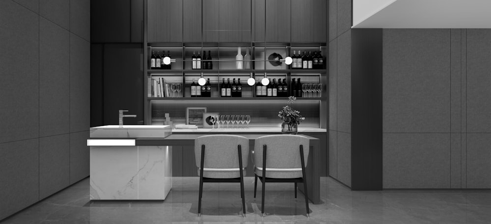 a black and white photo of a bar with two chairs