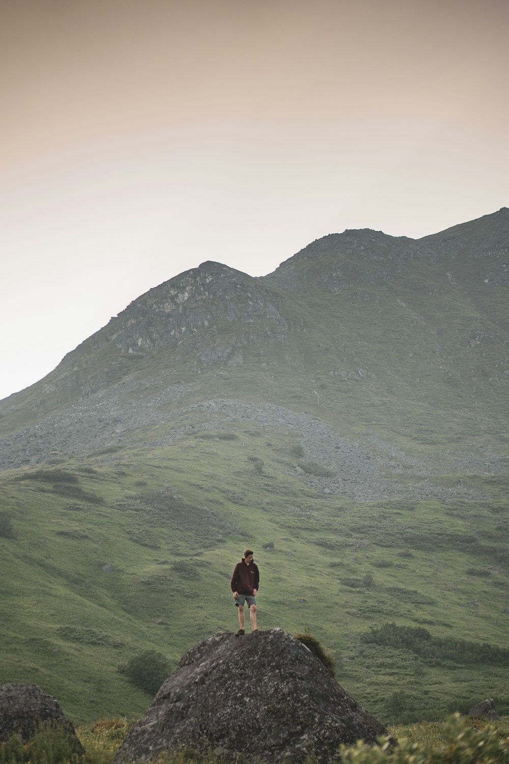 man standing on hill