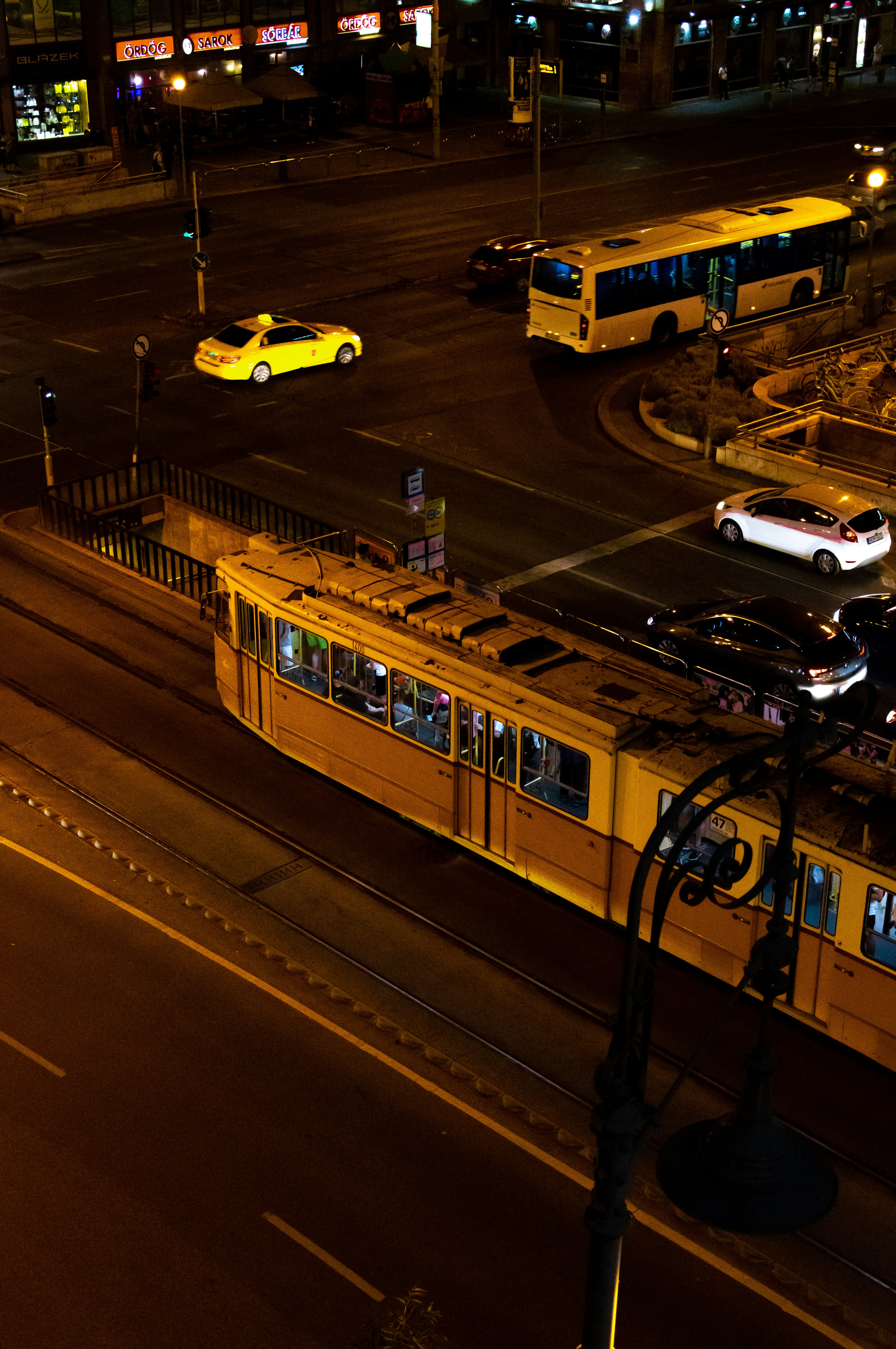 train near street during nighttime