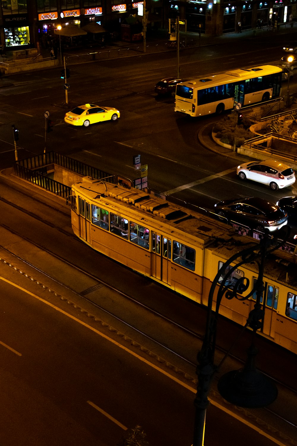 train near street during nighttime