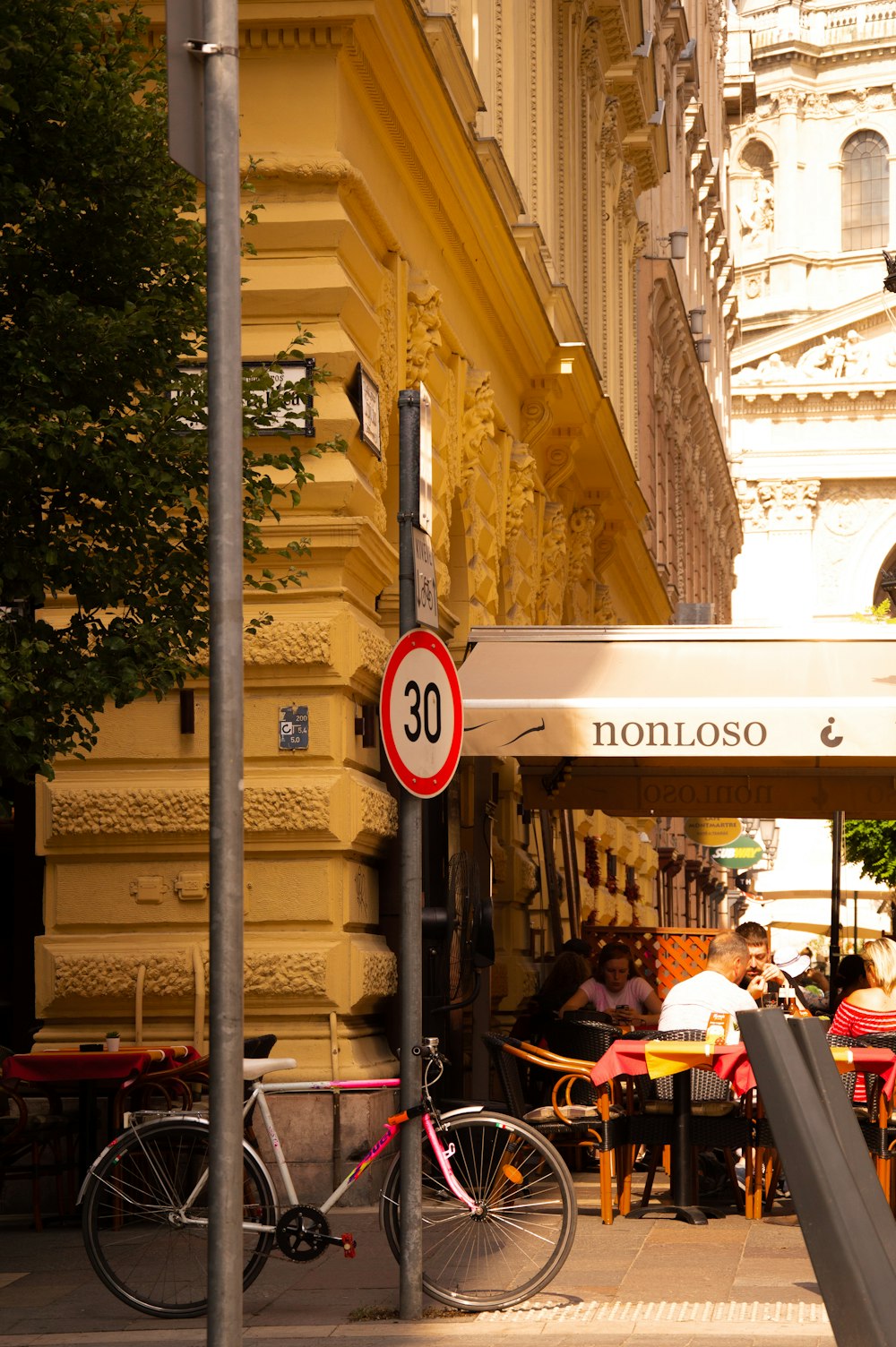 white and red street sign