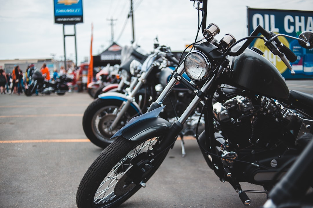 shallow focus photo of black cruiser motorcycle