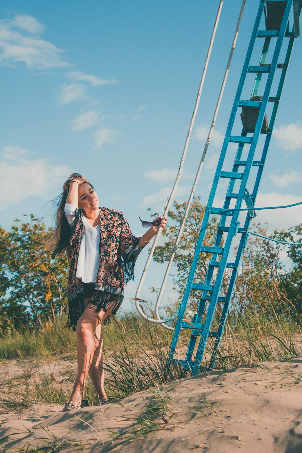 woman near blue stairs