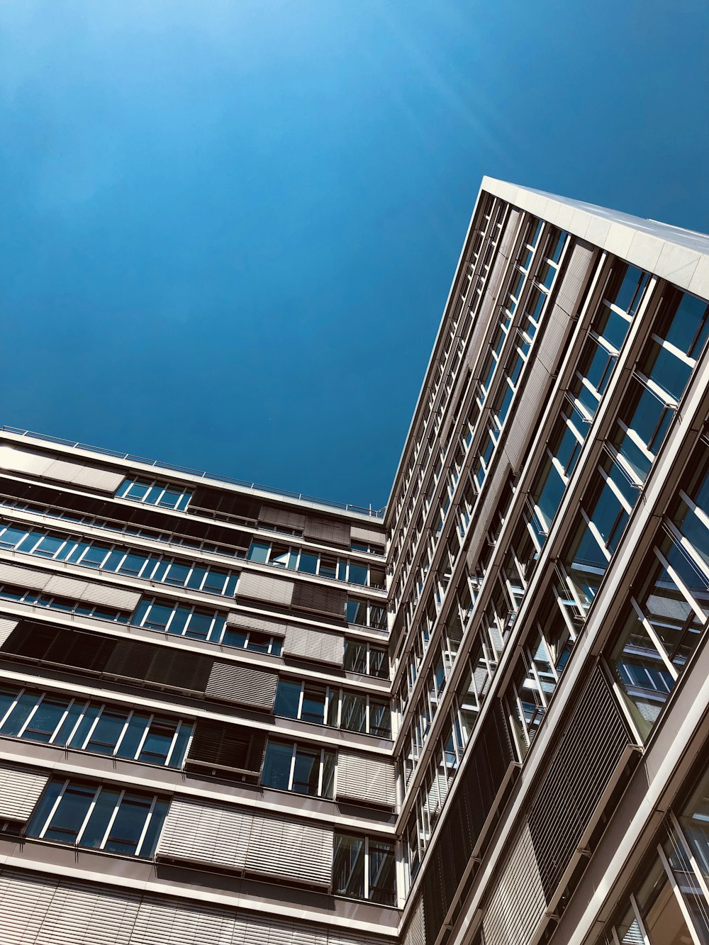 tall brown concrete building during daytime