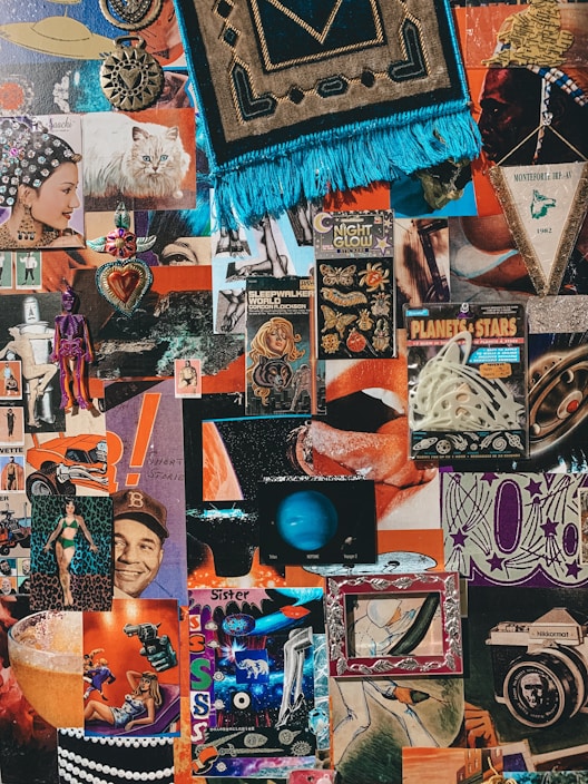 A vibrant collage features a mix of retro and eclectic elements, including vintage posters, illustrations, and various cutouts. There are images of planets, a tapestry with fringe, a white cat, and a dangling toy skeleton. Other items include heart-shaped objects, comic-style art, and old advertisements.