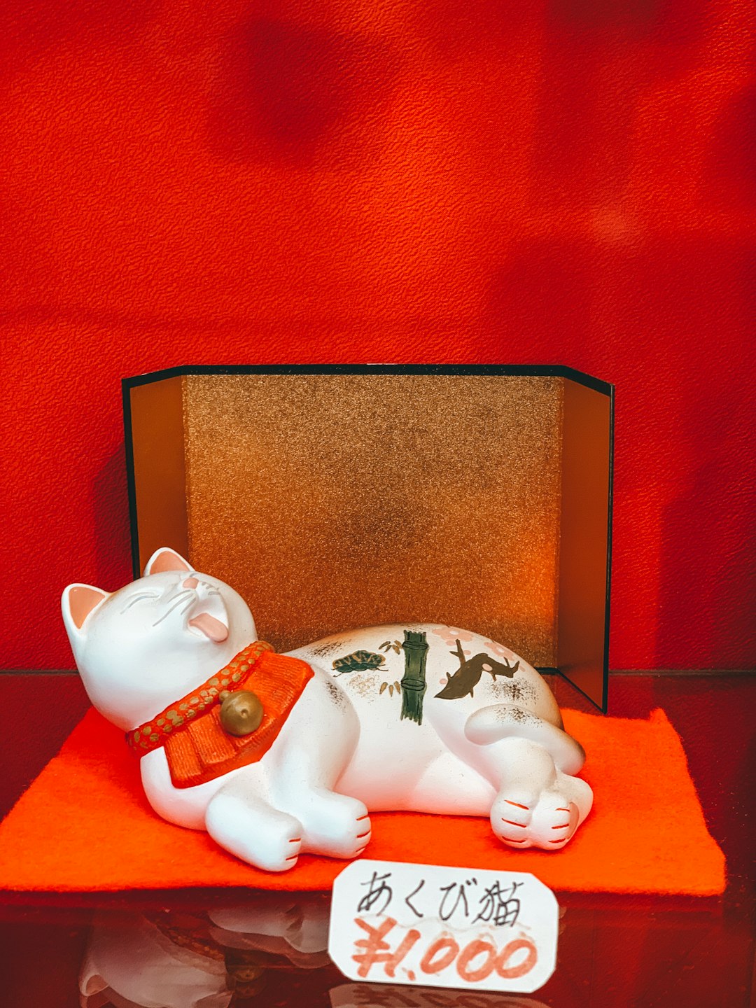 white cat figurine