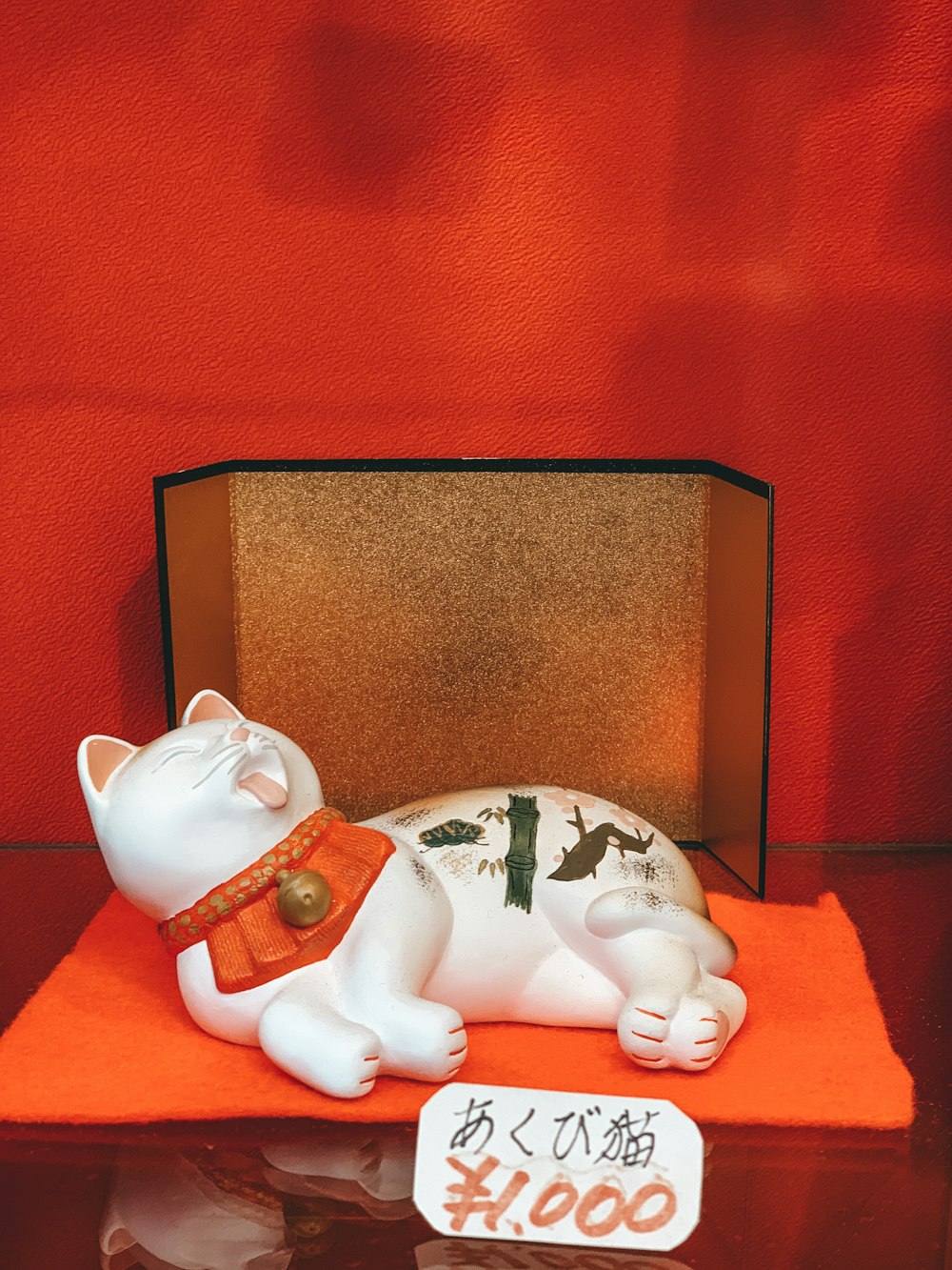 white cat figurine