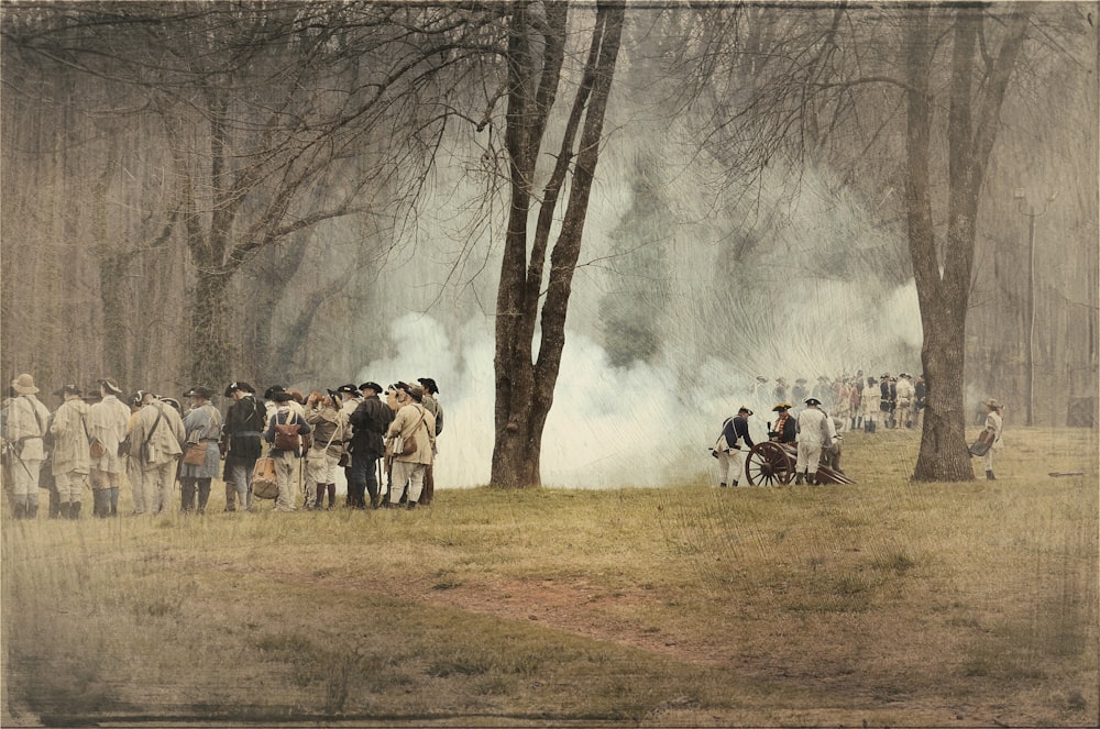 people standing near trees