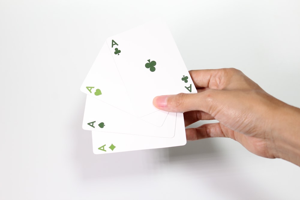 quatre cartes à jouer As