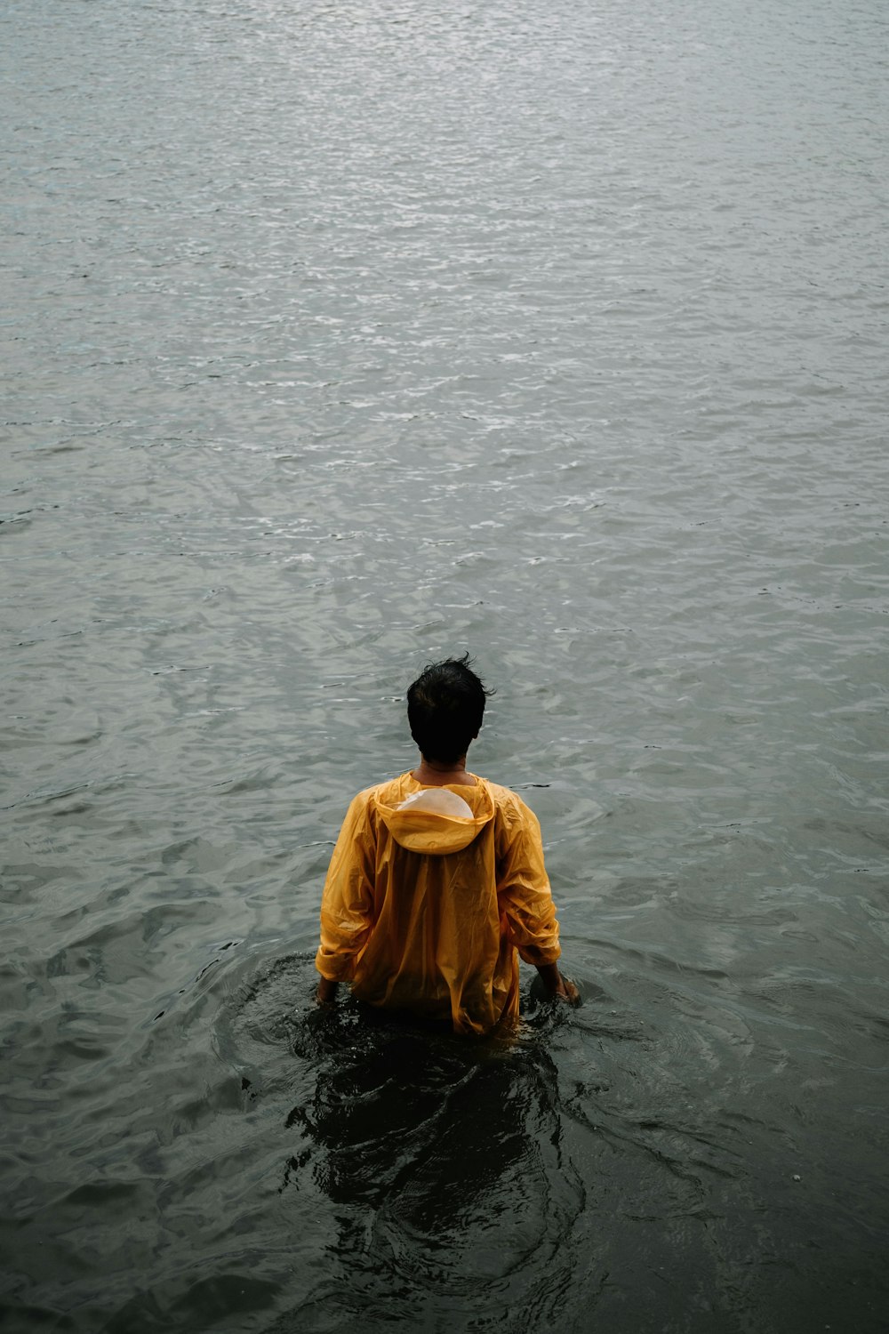 man standing on body of water