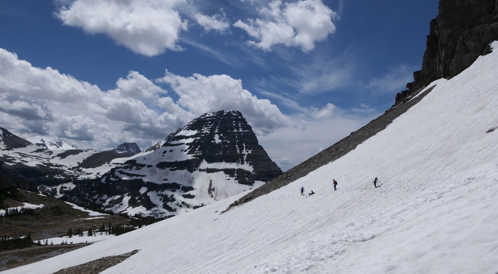 people near mountain