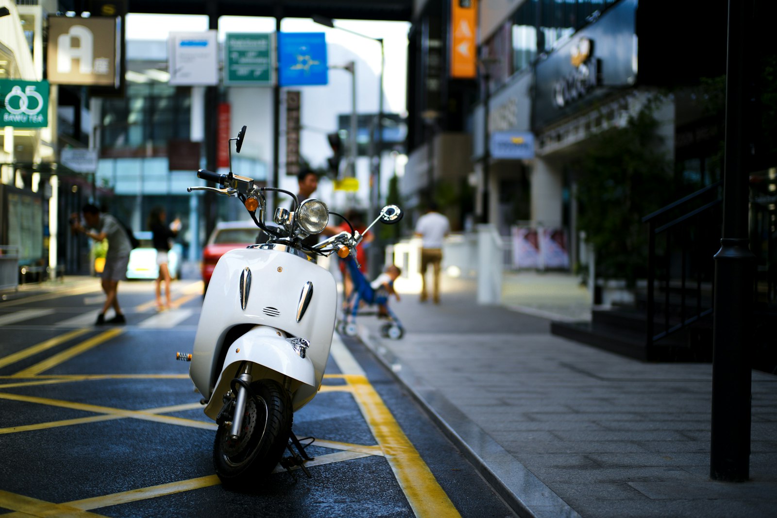 Leica Summilux-M 50mm F1.4 ASPH sample photo. Parked white motor scooter photography