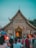 A happy customer sharing their experience at a temple.