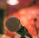 black and gray microphone on microphone stand