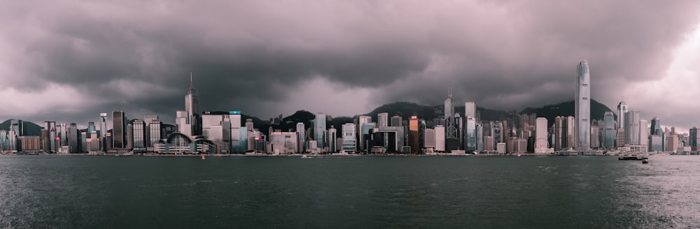 city under gray clouds