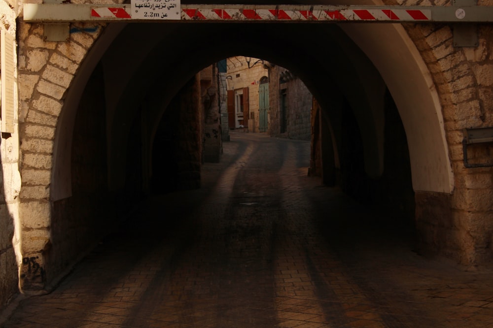 brown concrete pathway and bridge with no vehicle and people