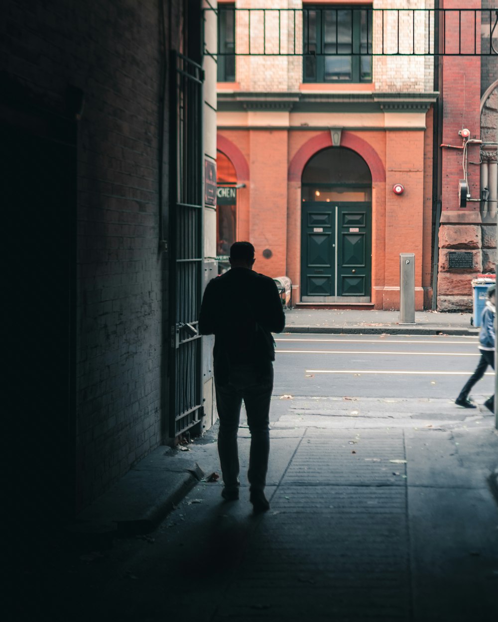 silhouette of man walking