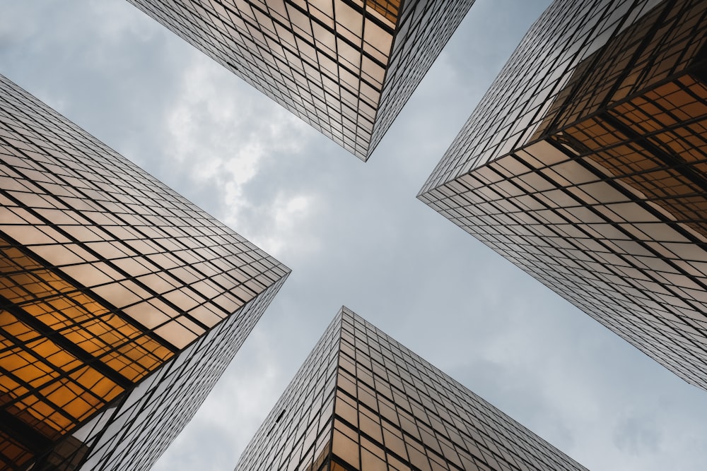 low-angle photography of high-rise buildings