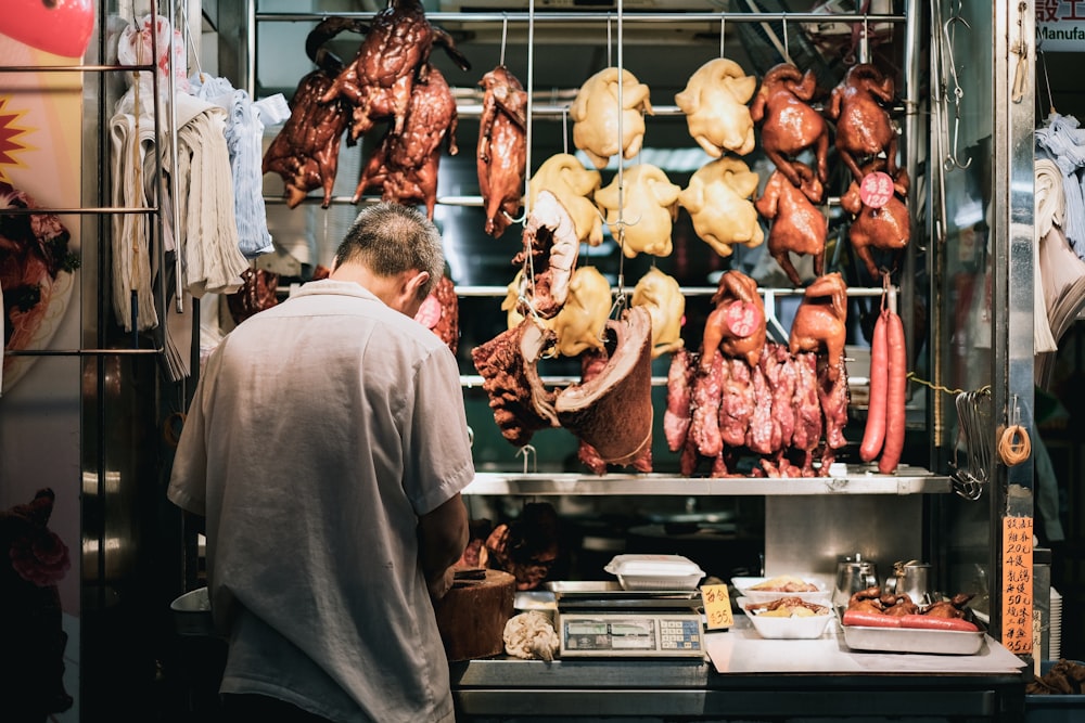 man standing on store