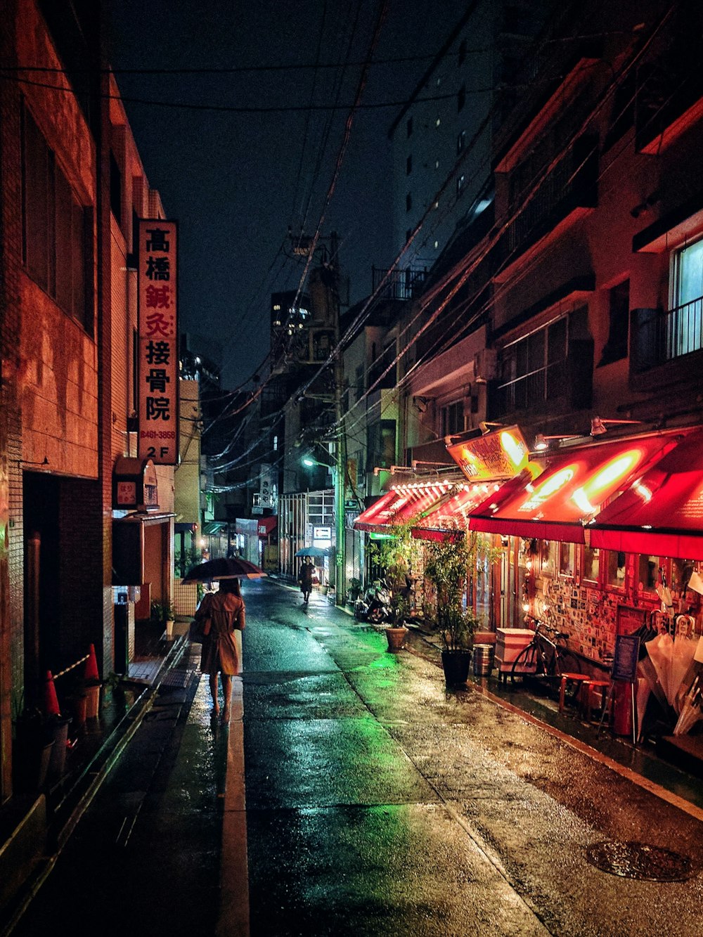 woman walking on sidewalk