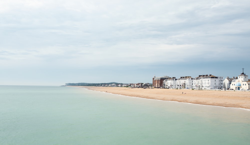 high-angle photography of city near sea