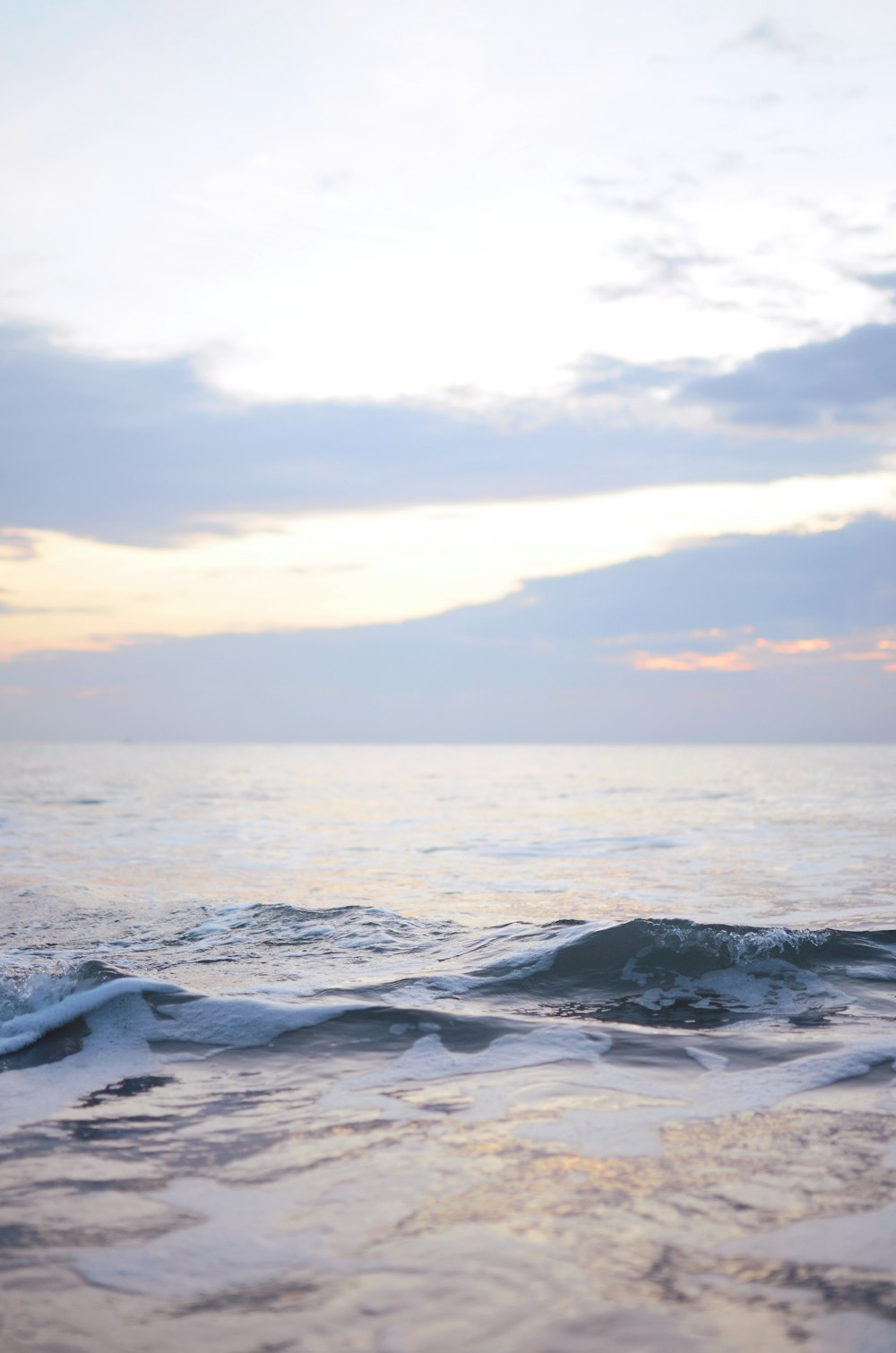 body of water during golden hour