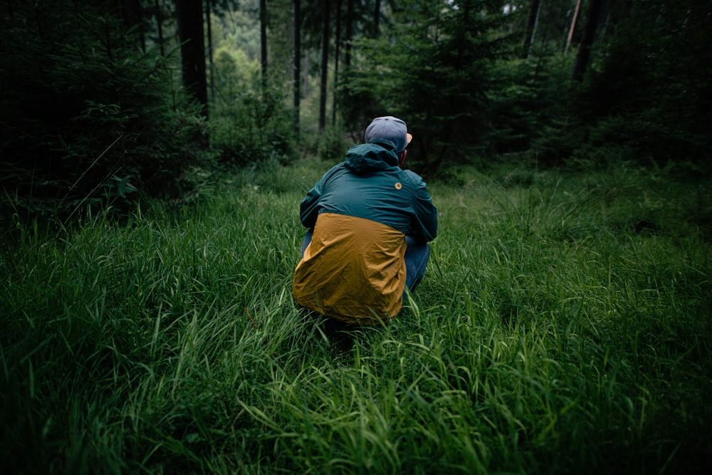 man wearing blue and yellow jacket